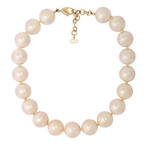 christian dior pearl necklace with gold 'dior' and stars|Christian Dior chunky necklace.